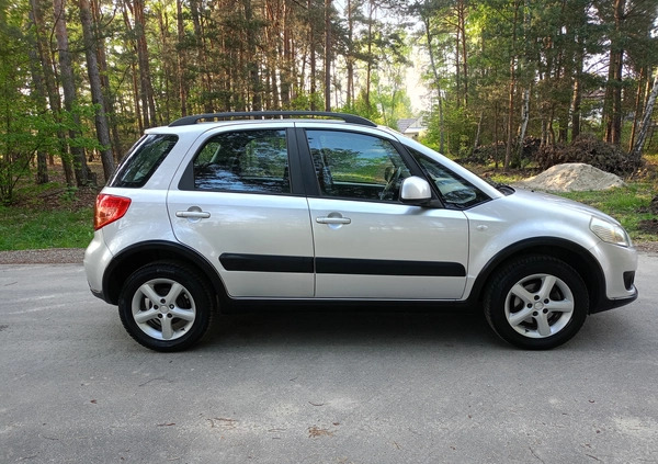 Suzuki SX4 cena 26990 przebieg: 170000, rok produkcji 2009 z Stepnica małe 379